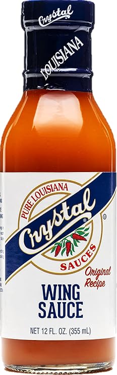 Crystal Original Buffalo Wing Sauce, 12 oz | A 12 oz bottle of ready-to-use Crystal Original Buffalo Wing Sauce with aged red cayenne pepper flavor.